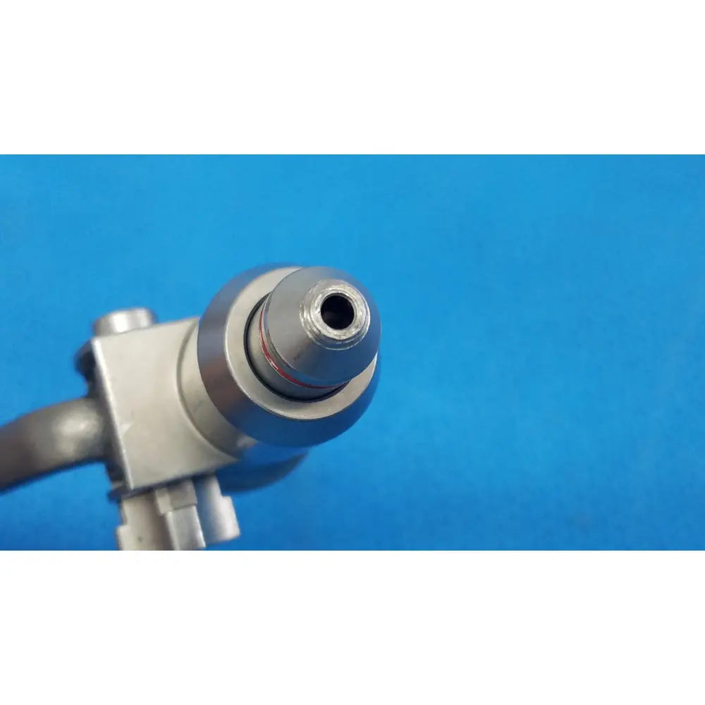 Silver-colored surgical pin collet with threaded tip and metallic housing for reuse medical orthopedic saws by stryker