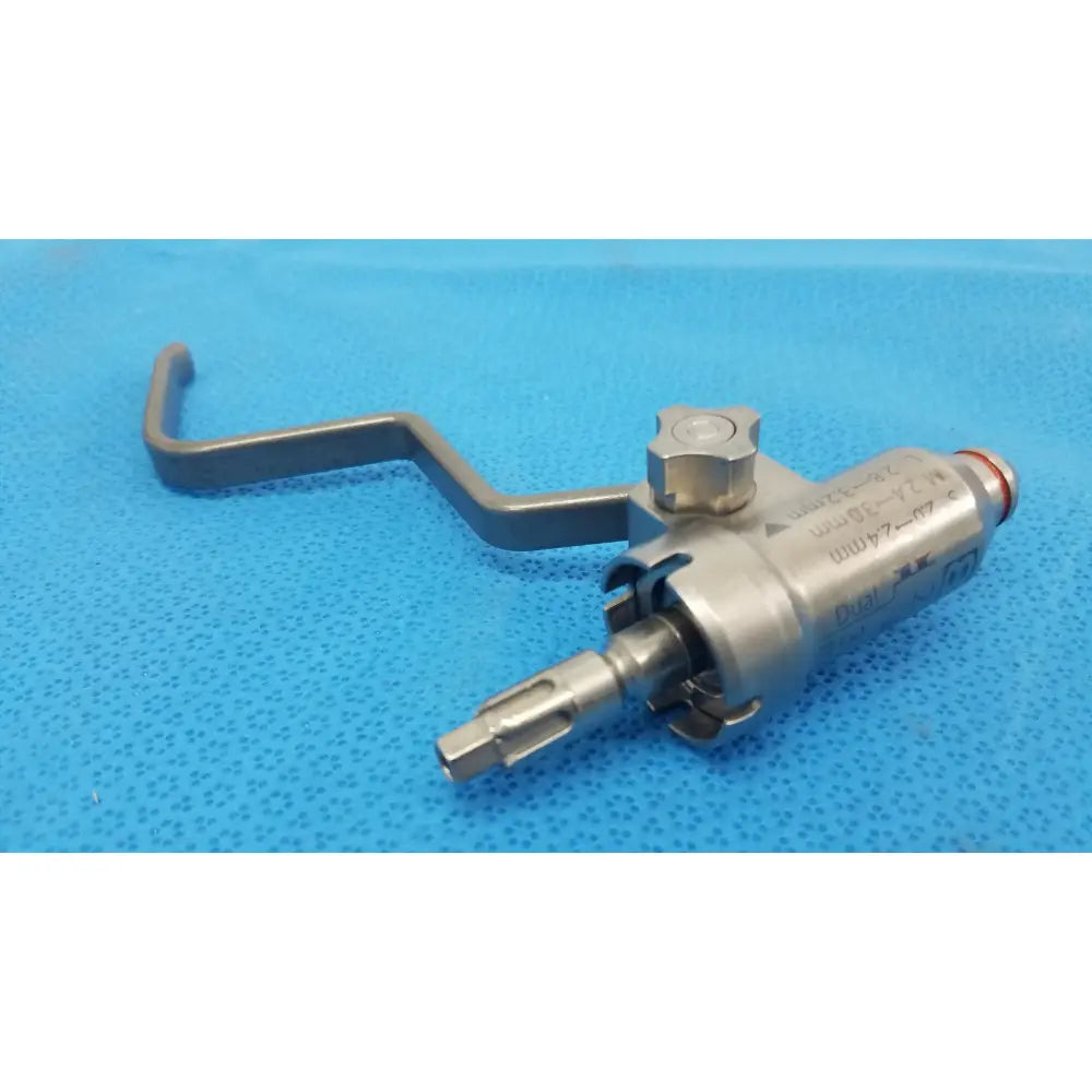 Silver Stryker 8203-126-000 pin collet with curved handle and engraved markings for reuse medical orthopedic saws