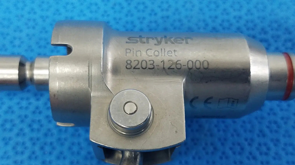 Stryker 8203-126-000 pin collet with metallic silver finish designed for precise reuse medical applications in orthopedic saws