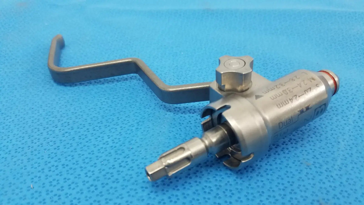Silver Stryker 8203-126-000 pin collet with curved handle and engraved markings for reuse medical orthopedic saws