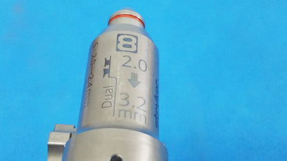 Stryker 8203-126-000 silver metallic pin collet with engraved markings and red-orange cap for reuse medical orthopedic saws