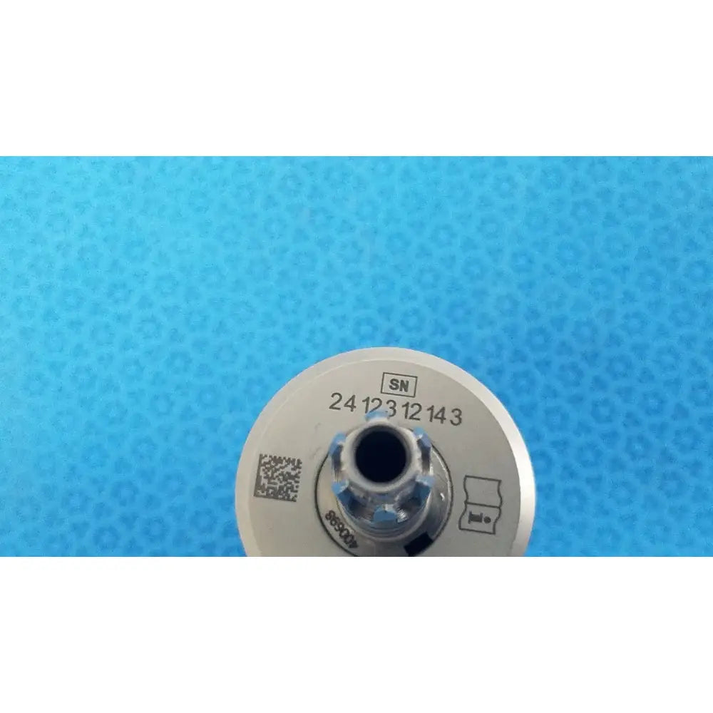 Silver locking keyless chuck with central threaded opening and engraved serial number for Stryker 8203-133-000 model