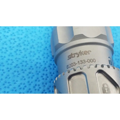Silver stryker 8203-133-000 1/4 locking keyless chuck with textured metal body and engraved model number for reuse medical use