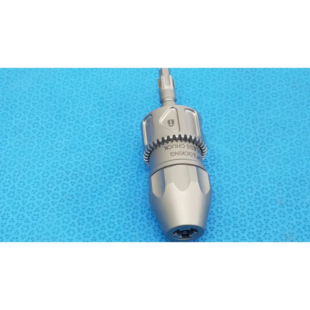 Stryker 8203-133-000 silver stainless steel locking keyless chuck with textured grip and engraved branding