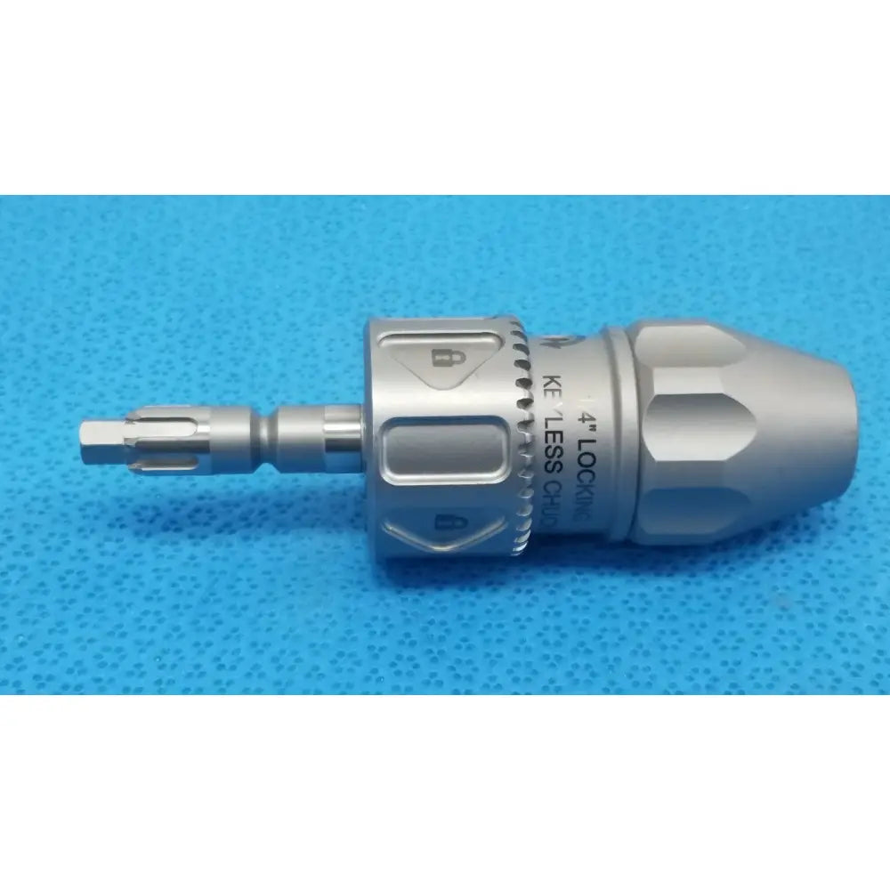 Stryker 8203-133-000 silver metallic locking keyless chuck with textured grip and engraved markings for reuse medical use