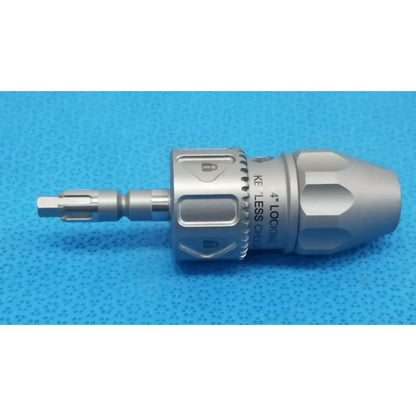 Stryker 8203-133-000 silver metallic locking keyless chuck with textured grip and engraved markings for reuse medical use
