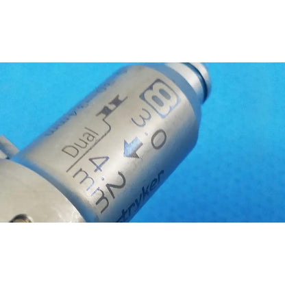 Silver-colored metallic large collet with dual 4 min engraving by tryker for reuse medical orthopedic instruments