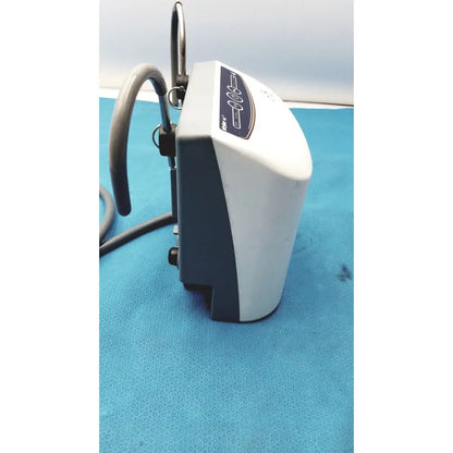 White and gray medical air loss pump with curved hose attachment for patient support by stryker air loss pump 2861