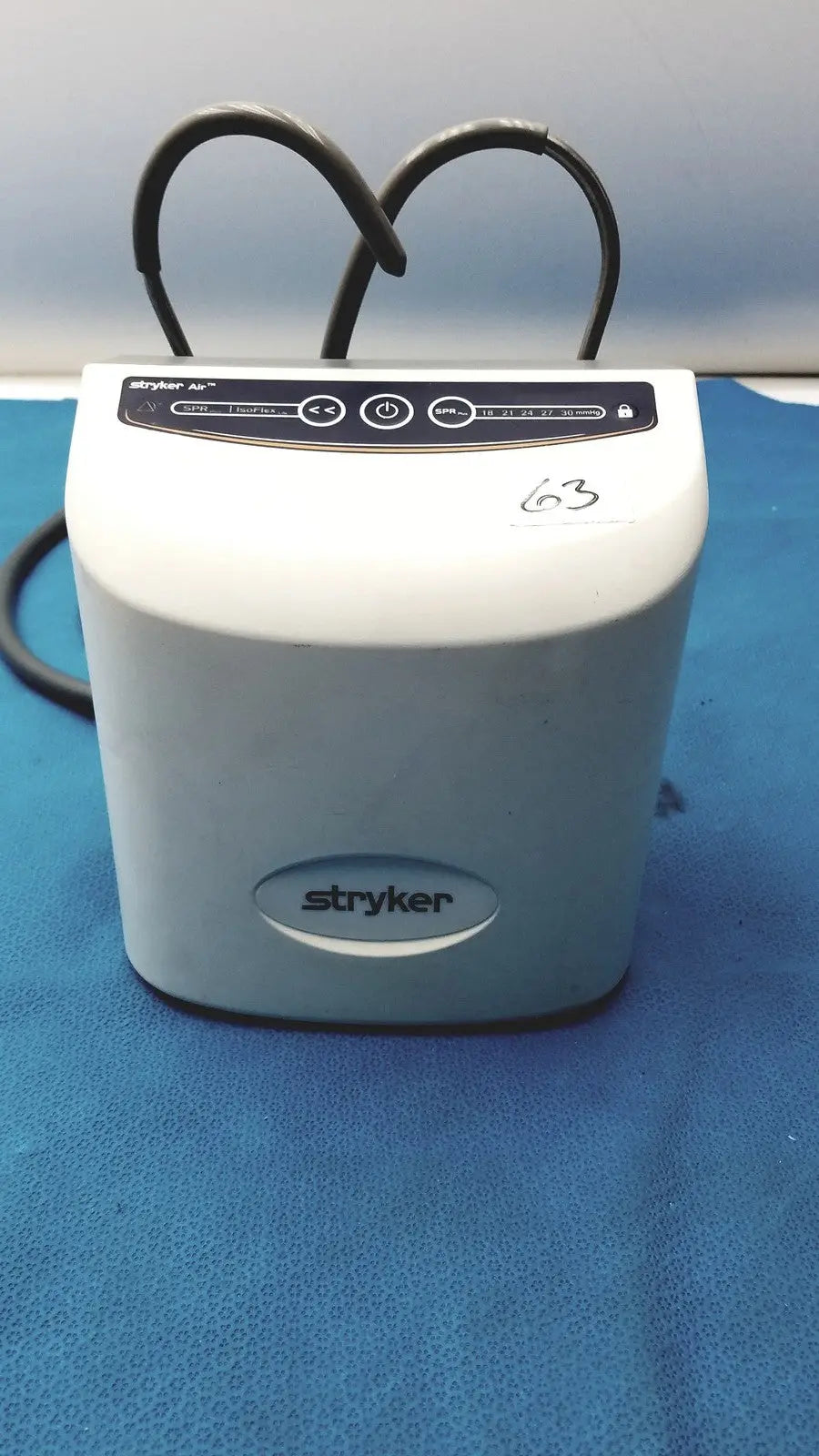 White stryker air loss pump 2861 with black control panel and coiled cables for medical use