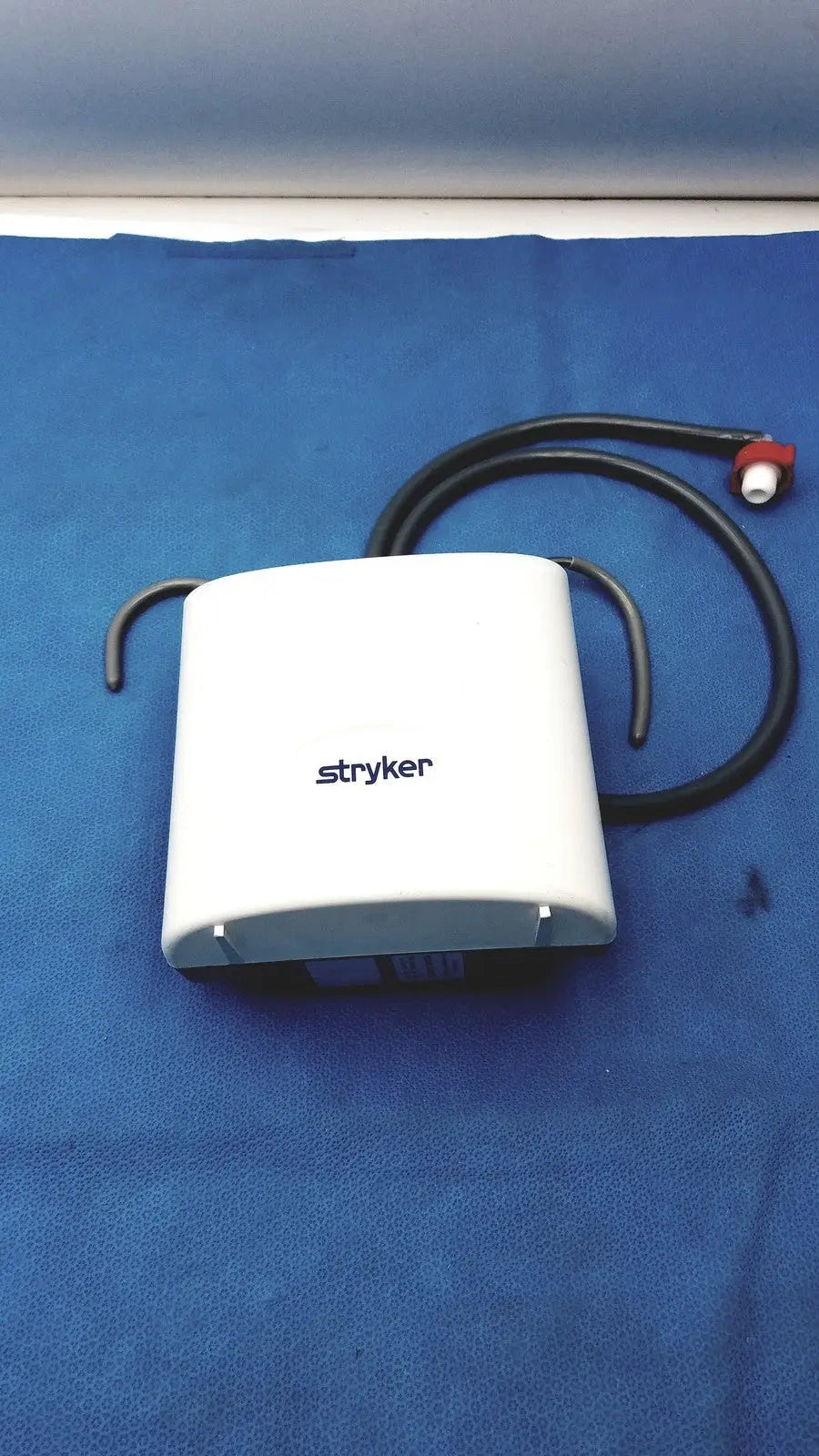 White Stryker air loss pump 2861 with black tubing and red connector for advanced pressure management