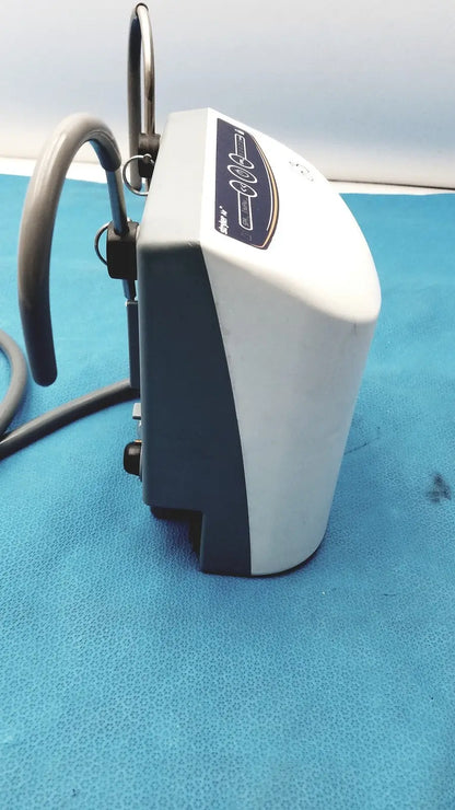 White and gray medical air loss pump with curved hose attachment for patient support by stryker air loss pump 2861