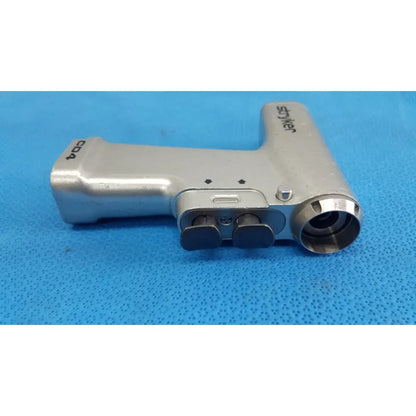 Silver stryker cd4 cordless driver universal handpiece with metallic finish and black dual trigger control knobs