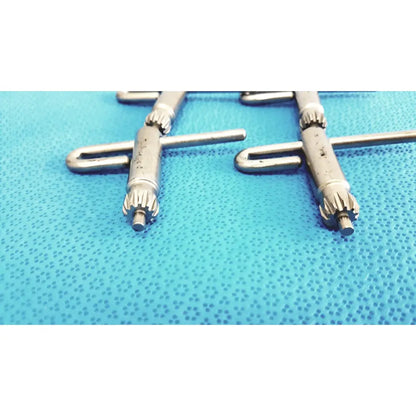 Silver surgical stryker chuck key screws with textured gear-like ends and cylindrical shafts for surgical drill systems lot 4