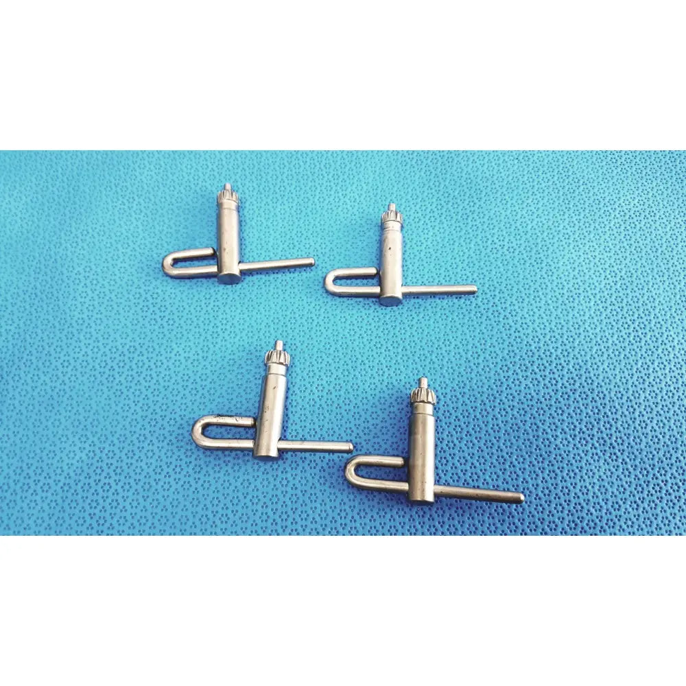 Four metallic silver stryker chuck keys with u-shaped handles and threaded tops for surgical drill systems lot of 4