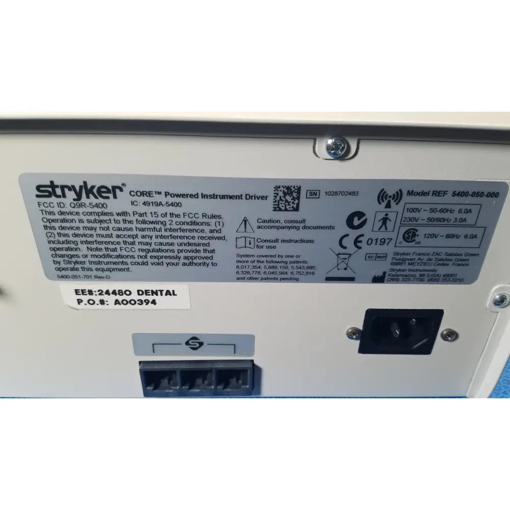 Stryker core powered instrument driver model 5400-060-000 with white plastic casing and black power input ports backside view