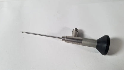 Silver stryker endoscopy 0° arthroscope with black rubberized grip and engraved markings for medical reuse