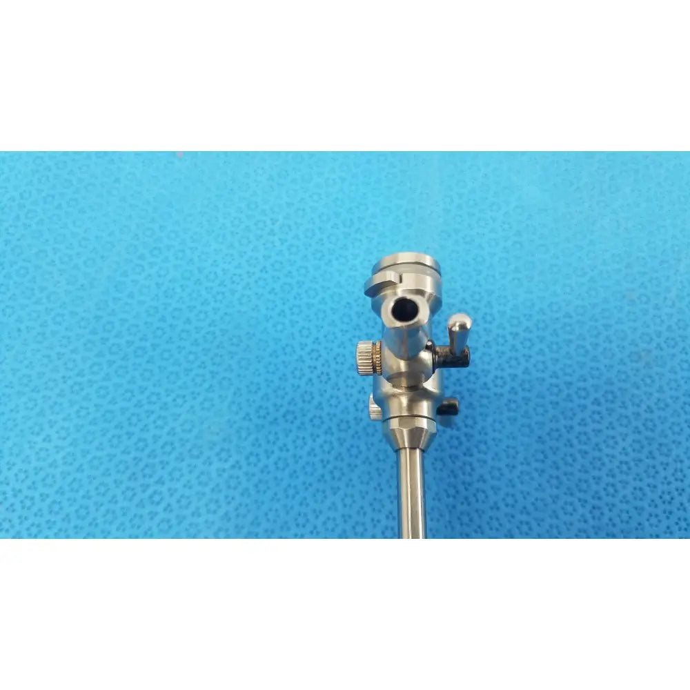 Silver stryker endoscopy 5.8mm surgical trocar with cylindrical shaft and adjustable components for surgical use
