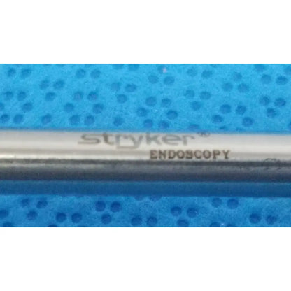 Stryker endoscopy 5.8mm surgical trocar with metallic cylindrical body and engraved branding for precise surgical use