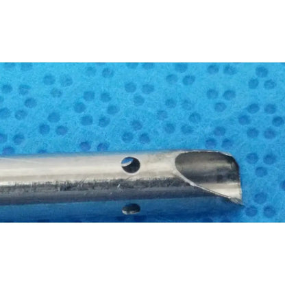 Silver stryker endoscopy 5.8mm surgical trocar with polished metallic finish and rounded hollowed end