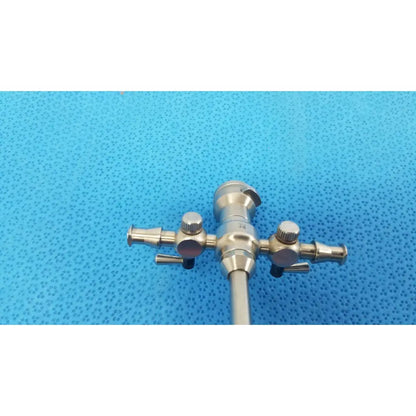Stainless steel Stryker Endoscopy 5.8mm surgical trocar with three adjustable knobs and central cylindrical body