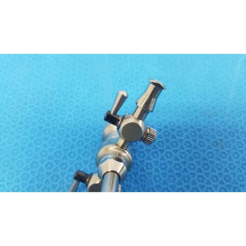 Stainless steel stryker endoscopy 5.8mm surgical trocar with textured grip and multiple adjustment knobs for precision