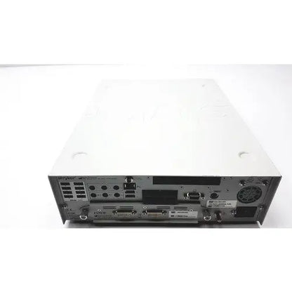 White metal server rack with multiple ports and ventilation slots on the back of stryker endoscopy sidne suite integrated control