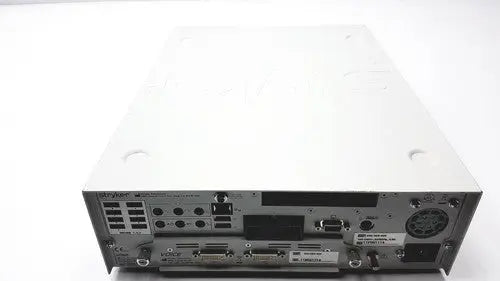 White metal server rack with multiple ports and ventilation slots on the back of stryker endoscopy sidne suite integrated control