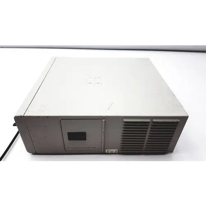 Beige plastic stryker endoscopy x6000 light source tower with small rectangular port and vertical side vent slats