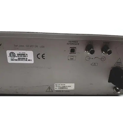 Silver metallic stryker endoscopy x6000 light source with multiple input output ports and certification labels back side