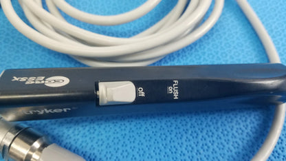 Black Stryker ESSx microdebrider handpiece with white toggle switch off flush for reuse medical equipment by Smiths Medical