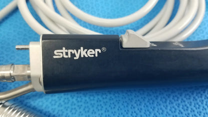 Stryker ESSx microdebrider handpiece with dark blue ergonomic handle featuring white branding for reuse medical equipment