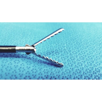 Silver stryker fenestrrated delicate grasper with serrated interlocking jaws and black-handled shaft surgical instrument