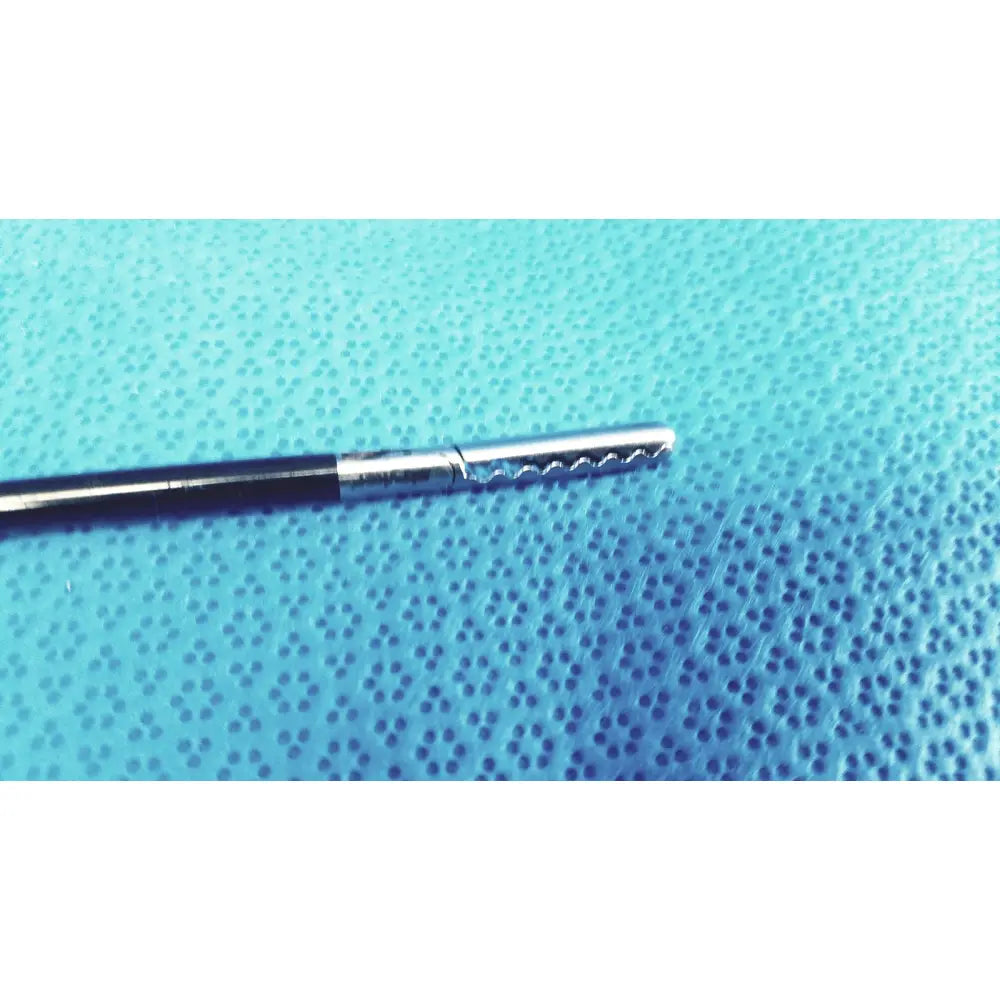Silver stryker fenestrrated delicate grasper with black handle and serrated tip for precision surgical use