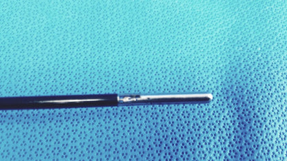 Stryker fenestrrated delicate grasper black and silver medical catheter with smooth tapered tip for precise handling