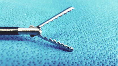 Silver stryker fenestrrated delicate grasper with serrated interlocking jaws and black-handled shaft surgical instrument