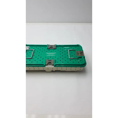 Green stryker gamma3 optional instrument set with perforated sterilization case lid and metallic latches
