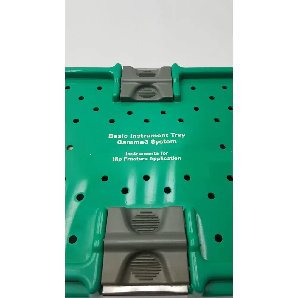 Green plastic optional instrument set tray with gray clasps for stryker gamma3 system hip fracture application