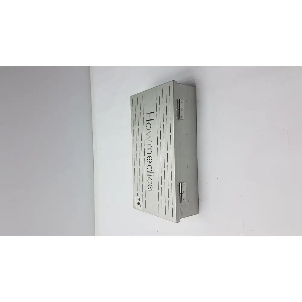 Silver metallic wall-mounted howmedica instrument storage box with textured pattern for instrument storage sterilization