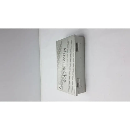 Silver metallic wall-mounted howmedica instrument storage box with textured pattern for instrument storage sterilization