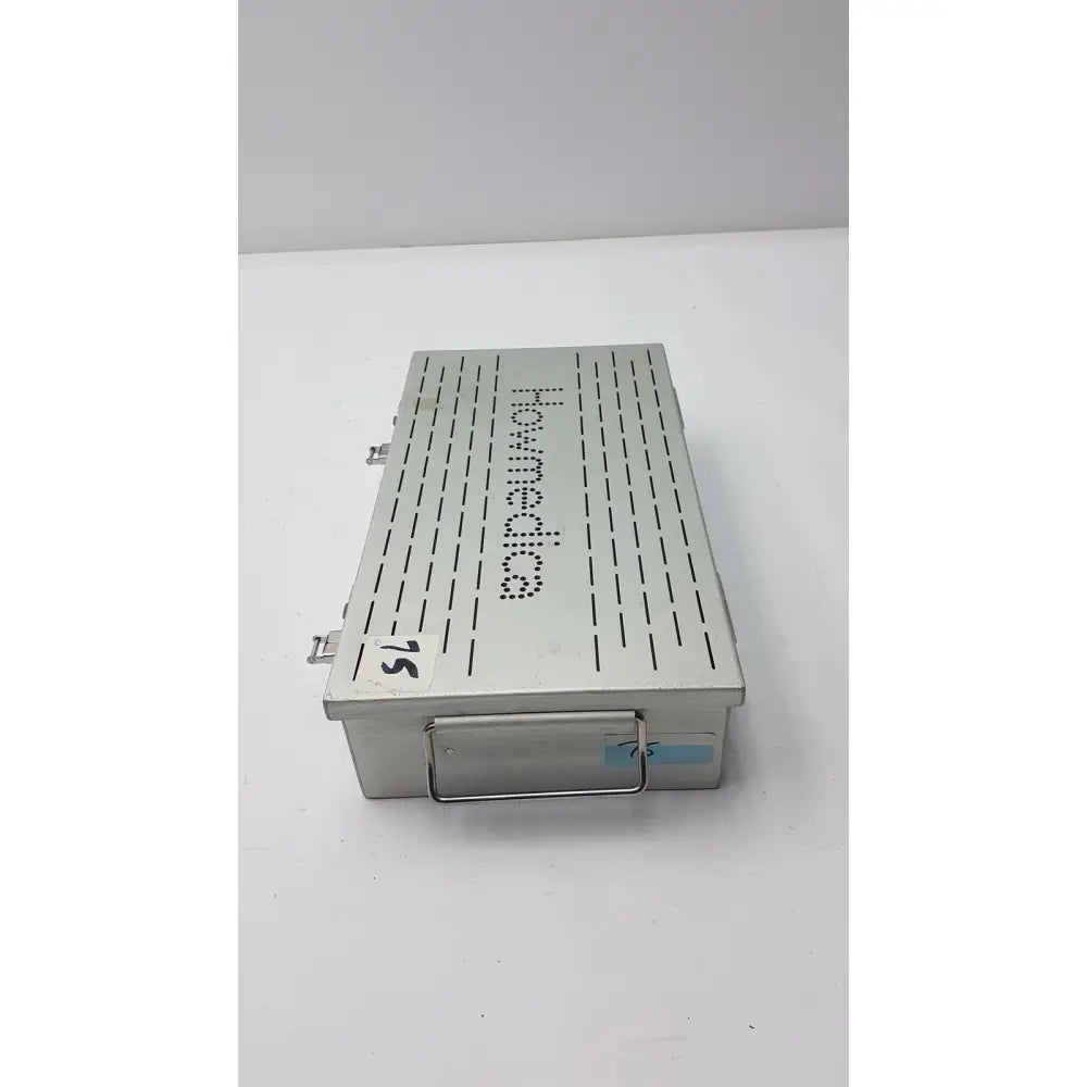 Silver metallic stryker howmedica instrument storage sterilization tray case with perforated lid and howmedica branding