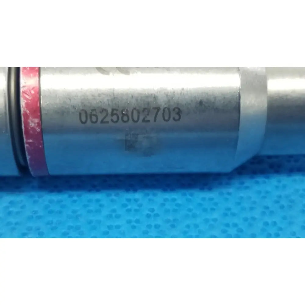 Silver cylindrical 1/4 reamer with engraved serial number and red rubber seal for reuse medical by stryker instruments