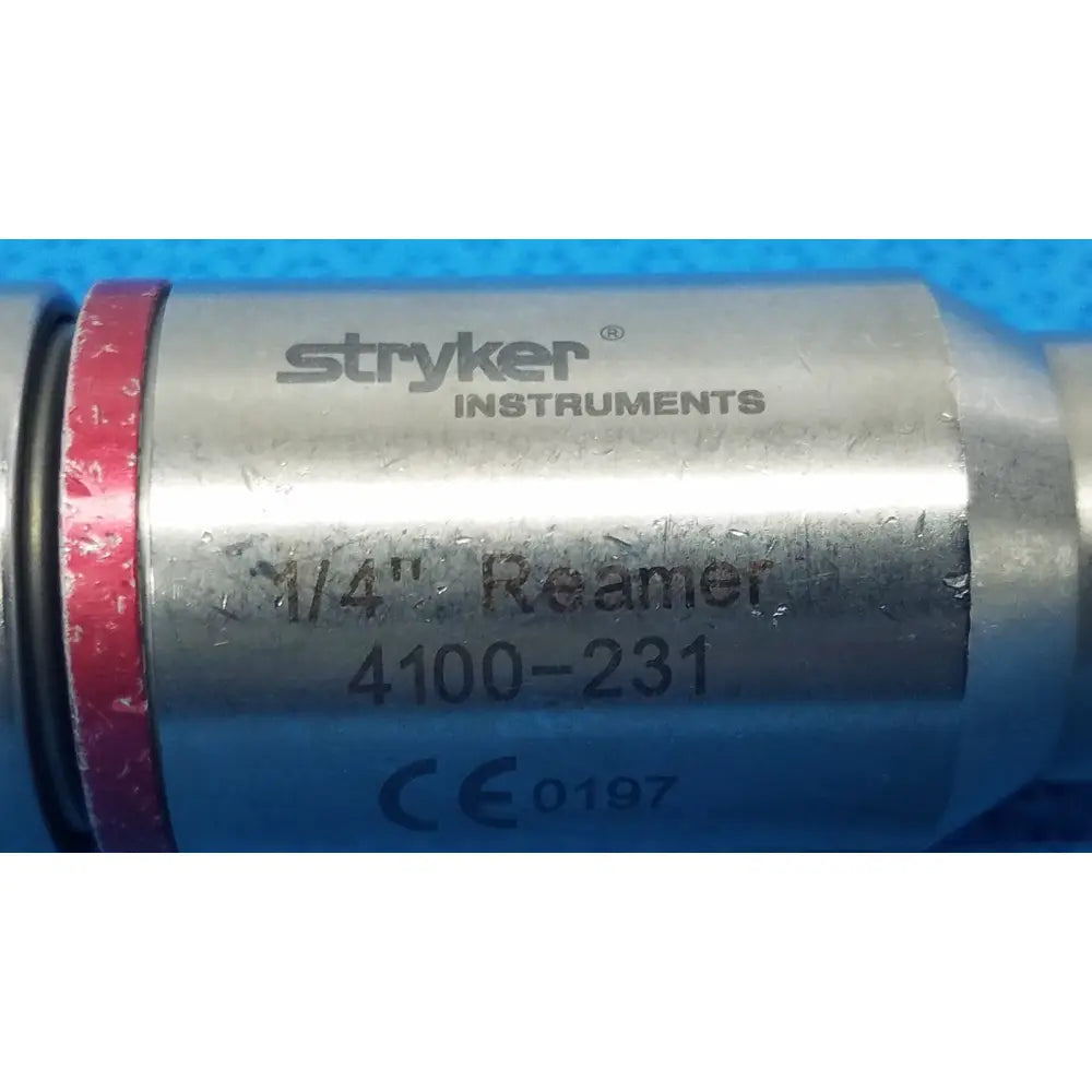 Silver metallic stryker instruments 1/4 inch reamer with red rubber band for reuse medical applications