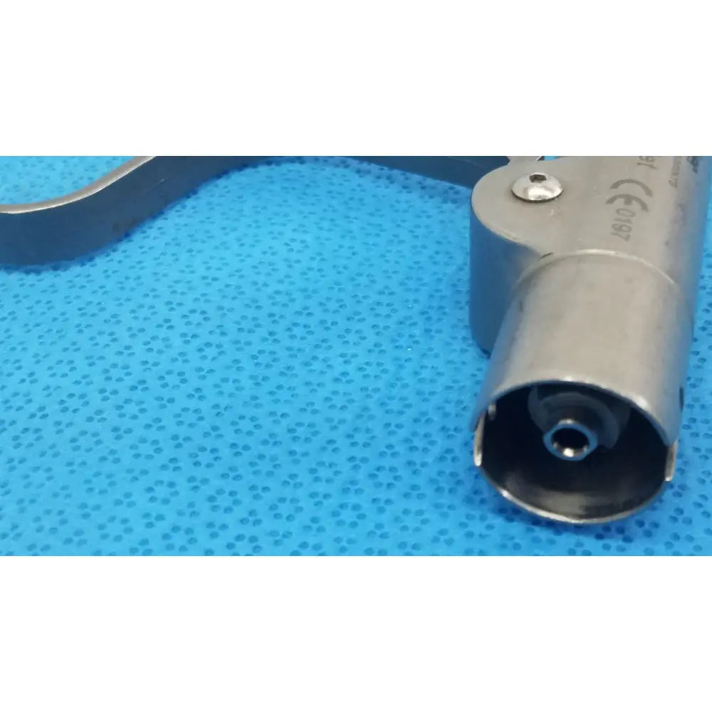 Silver metallic stryker instruments 4100-62 wire collet attachment with cylindrical body and engraved markings