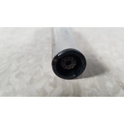 Black circular connector with multiple holes attached to translucent body of stryker instruments handswitch tps microdrill