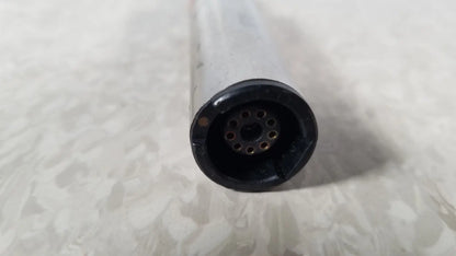 Black circular connector with multiple holes attached to translucent body of stryker instruments handswitch tps microdrill