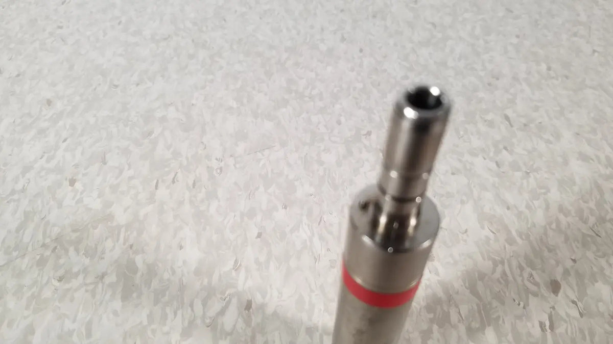 Silver metallic handswitch tps microdrill bit with red band for precision use by stryker instruments handswitch