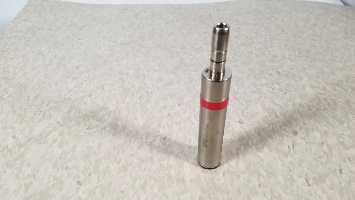 Silver metallic stryker instruments handswitch tps microdrill with red band and engraved text on its side