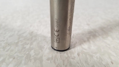 Silver cylindrical metal battery with engraved markings and black base for stryker instruments handswitch tps microdrill