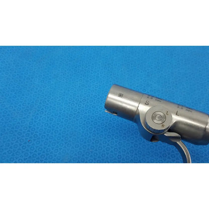 Silver stryker instruments pin collet 4100-126 surgical tool with engraved size markings and toggle switch