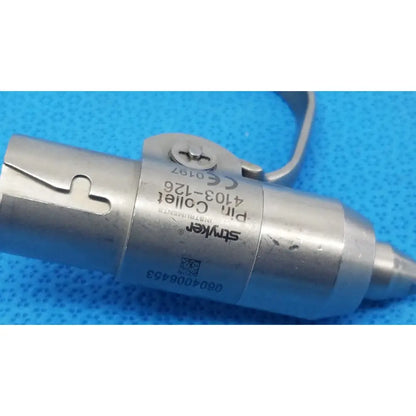 Stryker instruments pin collet 4103-126 is a metallic surgical instrument with engraved markings and a curved handle